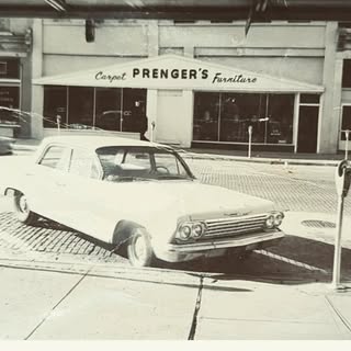 Prenger's Flooring America old photo of storefront in Carroll, IA